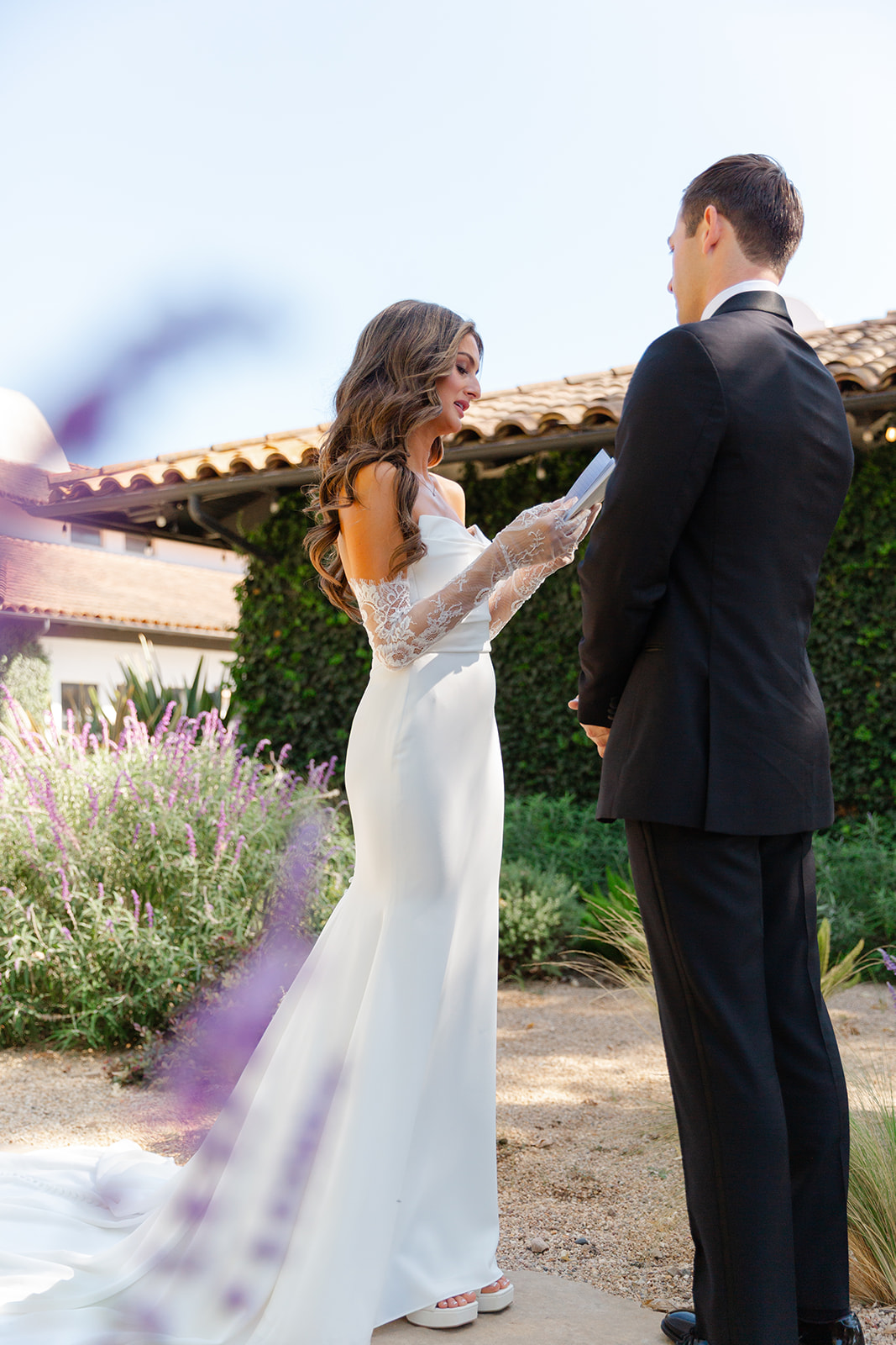 Jake and Zoe facing each other during their first look at Santa Ynez Ranch.