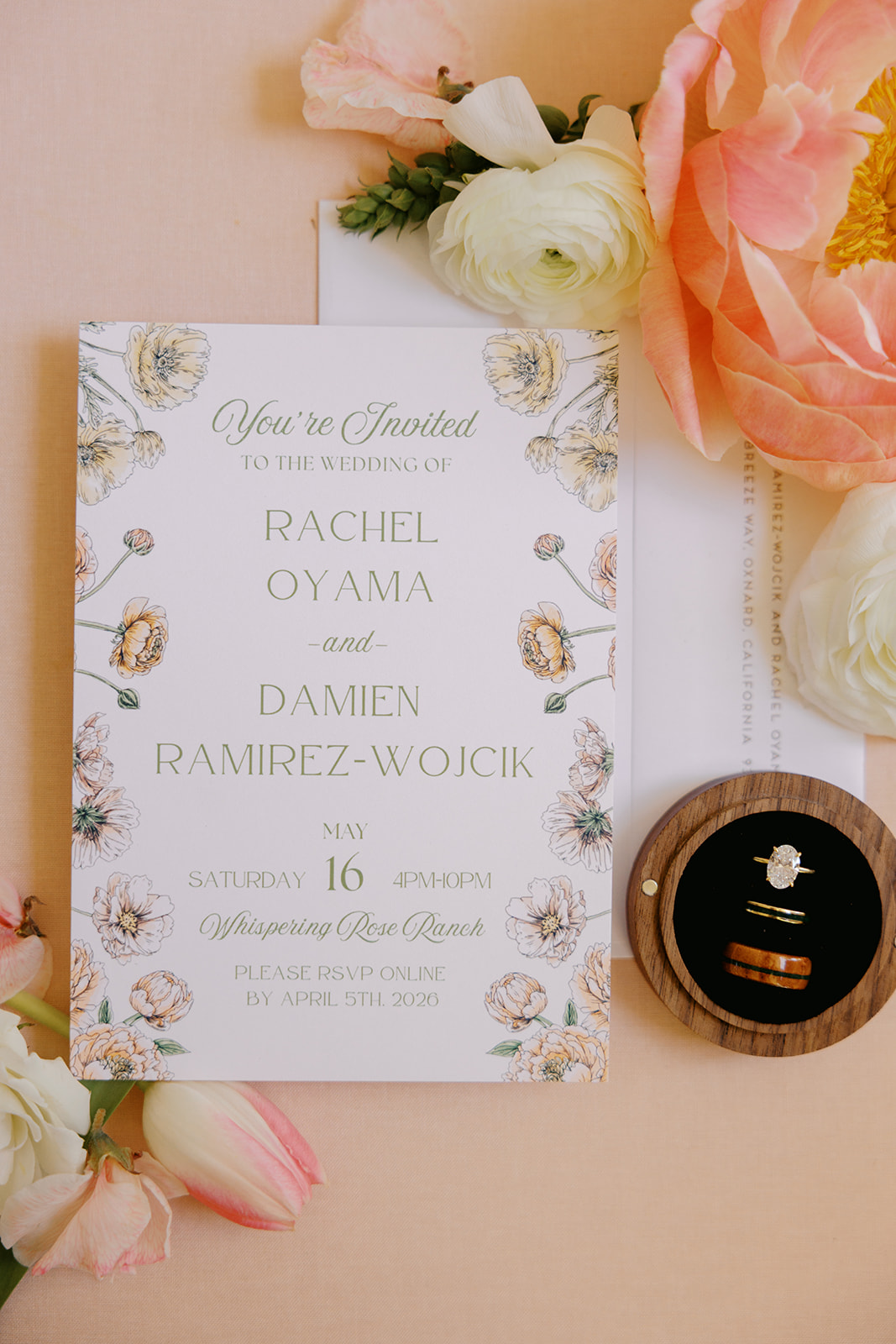 Rachel and Damien’s floral invitation suite with their wedding rings