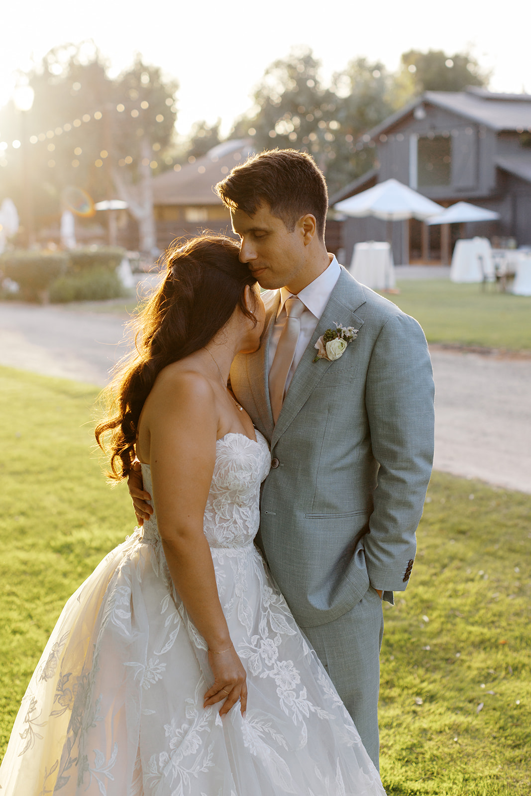 Rachel and Damien sharing a quiet moment in warm evening light
