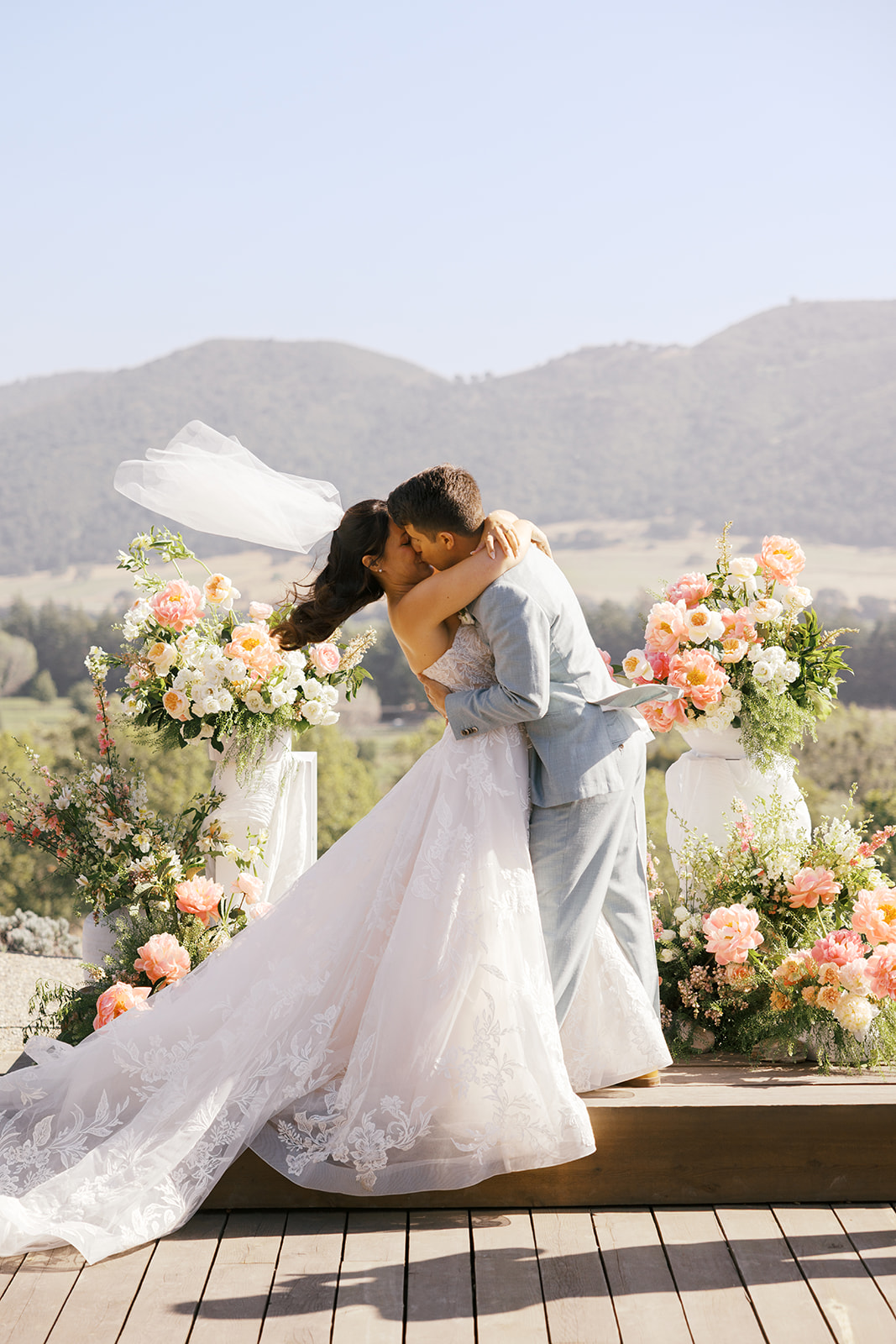 Rachel and Damien sharing their first kiss against the Santa Ynez Valley hills