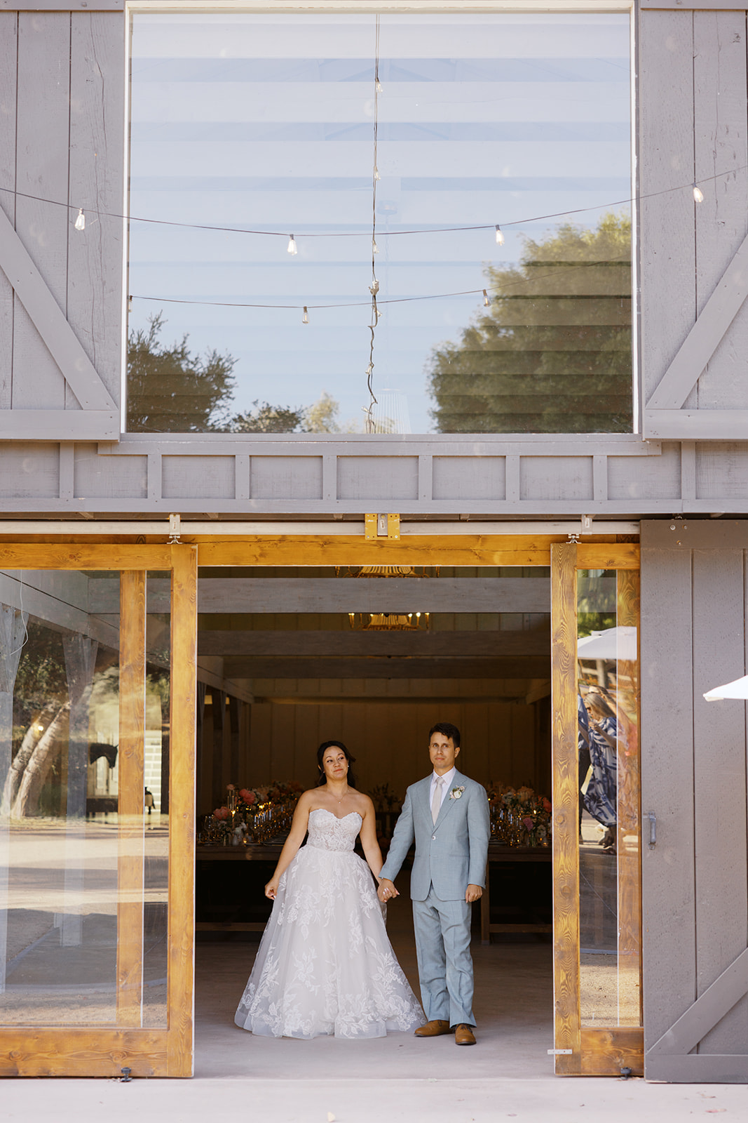 Rachel and Damien at the barn entrance