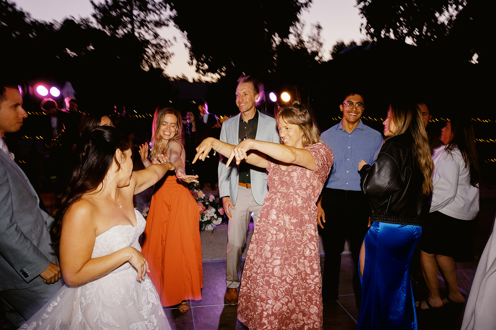 Guests celebrating on the outdoor dance floor