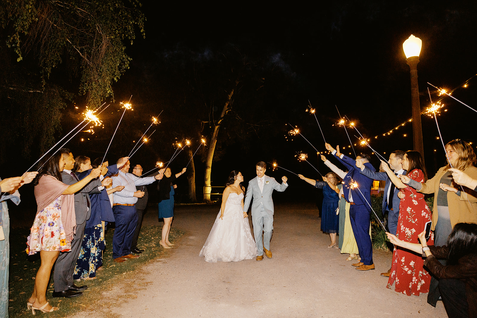 Rachel and Damien beginning their sparkler exit