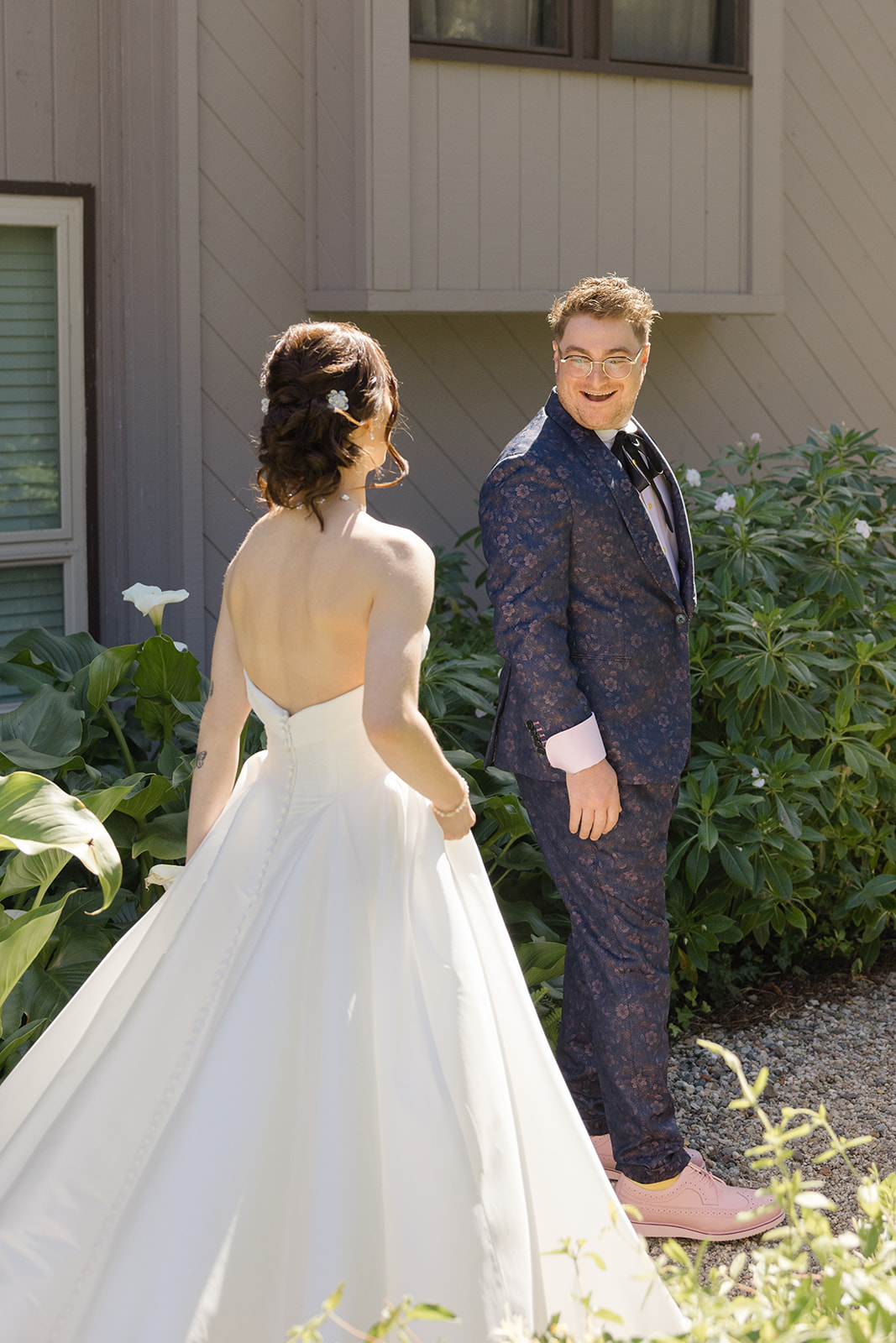 Jordan smiling as he sees Sara during their first look