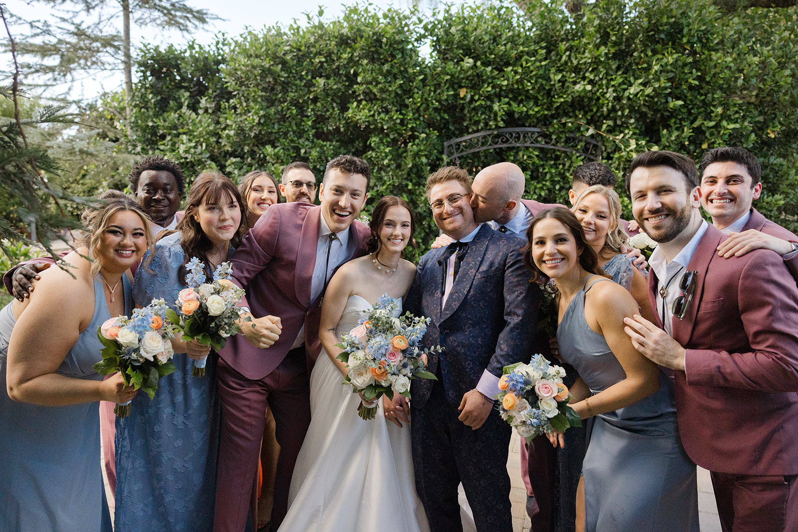 Jordan and Sara with their wedding party at Maravilla Gardens